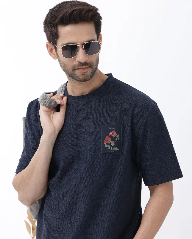 Men's Shirts with Adjustable CuffsRare Rabbit Mens Loopet Navy Cotton Lycra Fabric Half Sleeves Floral Print Pocket Detailing Oversized Fit Solid T-Shirt Men's Shirts with Adjustable CuffsRare Rabbit Mens Loopet Navy Cotton Lycra Fabric Half Sleeves Floral Print Pocket Detailing Oversized Fit Solid T-Shirt