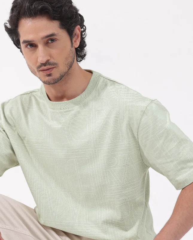 Men's Shirts with Convertible CollarsRare Rabbit Articale Men's Hagrid Pastel Green Cotton Polyester Fabric Crew Neck Oversized Fit Branded Graphic Print T-Shirt
