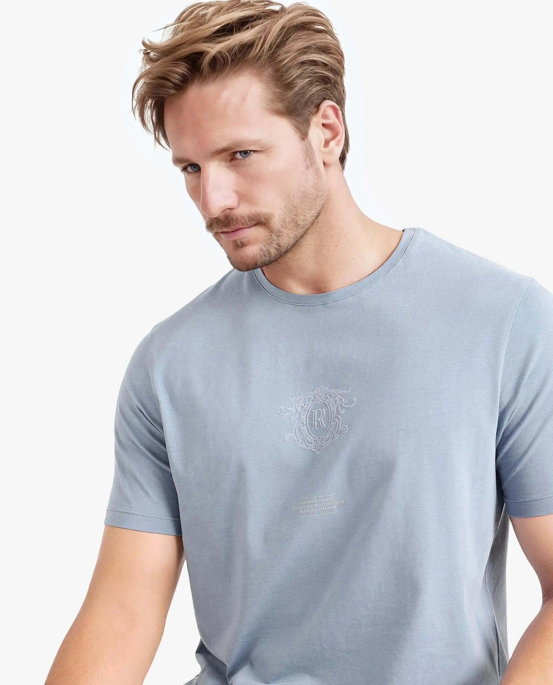 Men's Shirts with Roll-Up SleevesRare Rabbit Men Ker Blue Cotton Lycra Fabric Short Sleeve Crew Neck Regular Fit Graphic Flock Print T-Shirt Men's Shirts with Roll-Up SleevesRare Rabbit Men Ker Blue Cotton Lycra Fabric Short Sleeve Crew Neck Regular Fit Graphic Flock Print T-Shirt