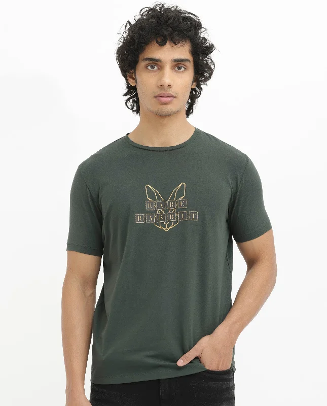 Men's Shirts for Outdoor ActivitiesRare Rabbit Men's Bion-1 Olive Cotton Lycra Fabric Short Sleeve Crew Neck Logo Graphic Print T-Shirt Men's Shirts for Outdoor ActivitiesRare Rabbit Men's Bion-1 Olive Cotton Lycra Fabric Short Sleeve Crew Neck Logo Graphic Print T-Shirt