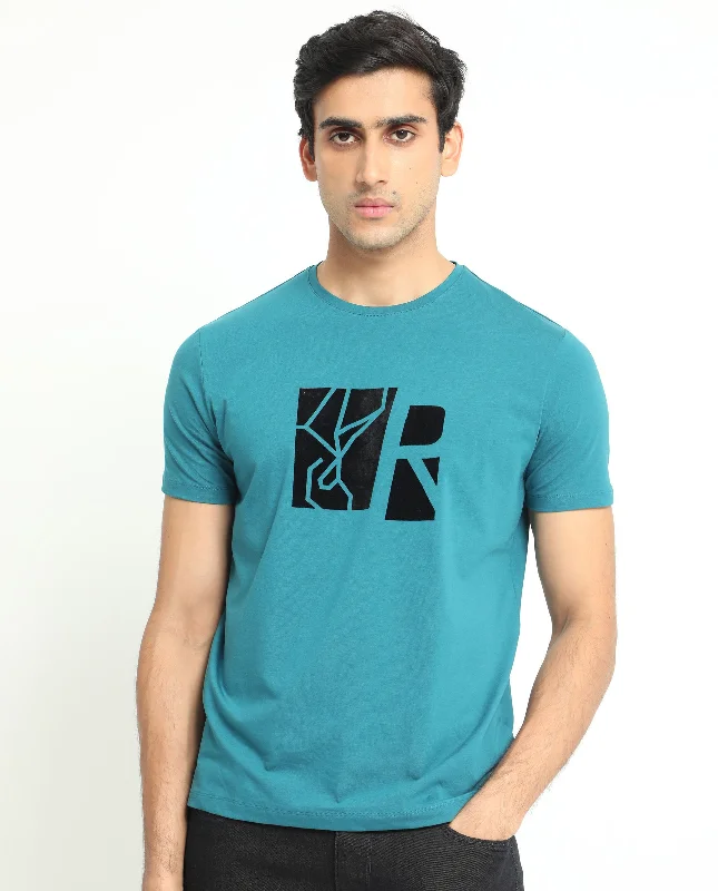 Men's Performance Shirts for SportsRare Rabbit Men's Dela Teal Crew Neck Flock Print Branding with Monogram and Logo Half Sleeves Regular Fit T-Shirt